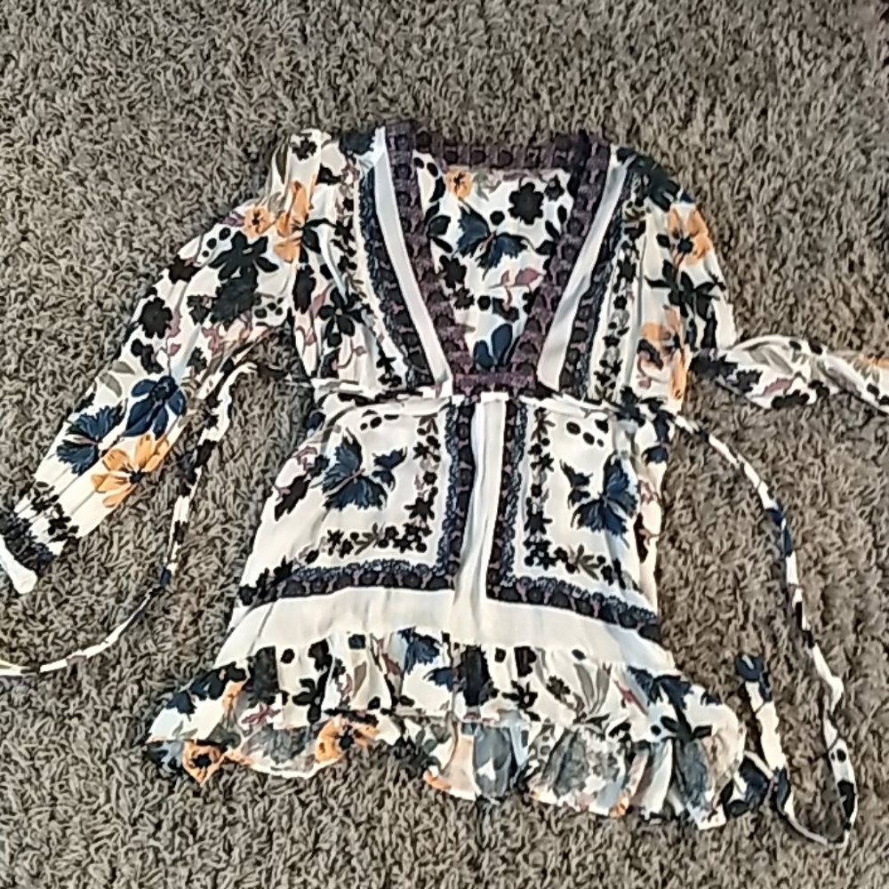 Free people-Great low cut top or ultra mini dress